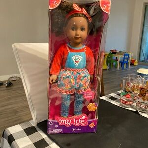 Doll with Red and Blue Outfit my life as a baker